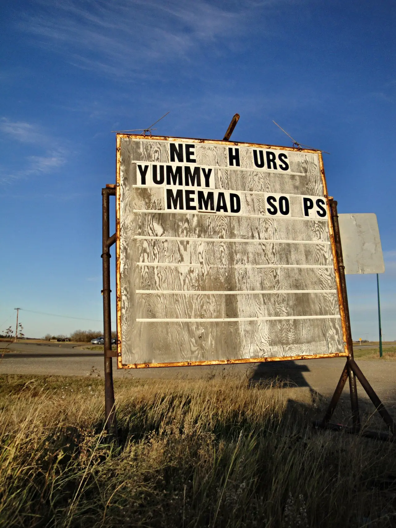 Roadside sign for the Hen House Cafe, 2011